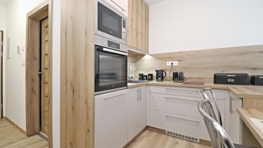 Moderní a úsporný byt 1+1 (25,9 m²) s balkónem a sklepem – Jihlava, Královský vršek